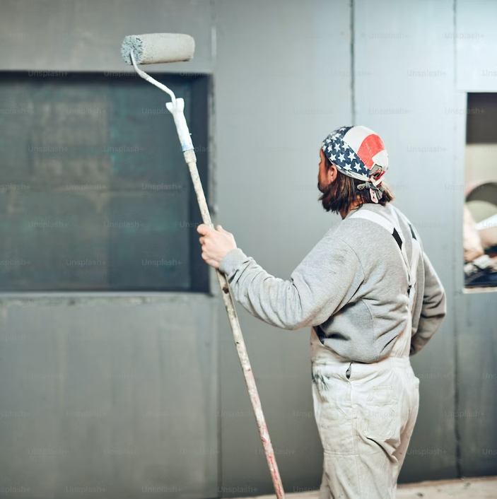 Vanilla Paints, man painting a Commercial Building in Ottawa, Ontario, Canada